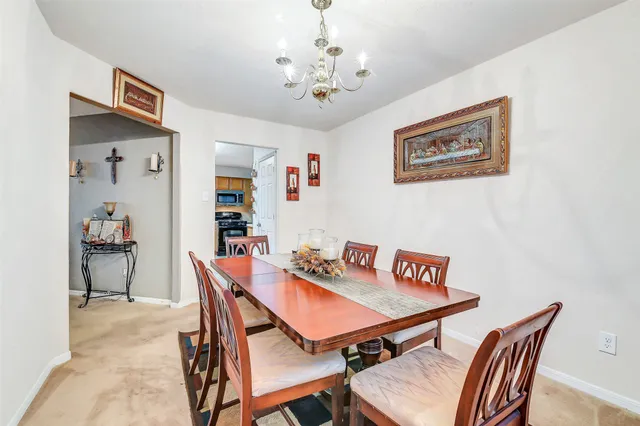 a view of a dining room with furniture