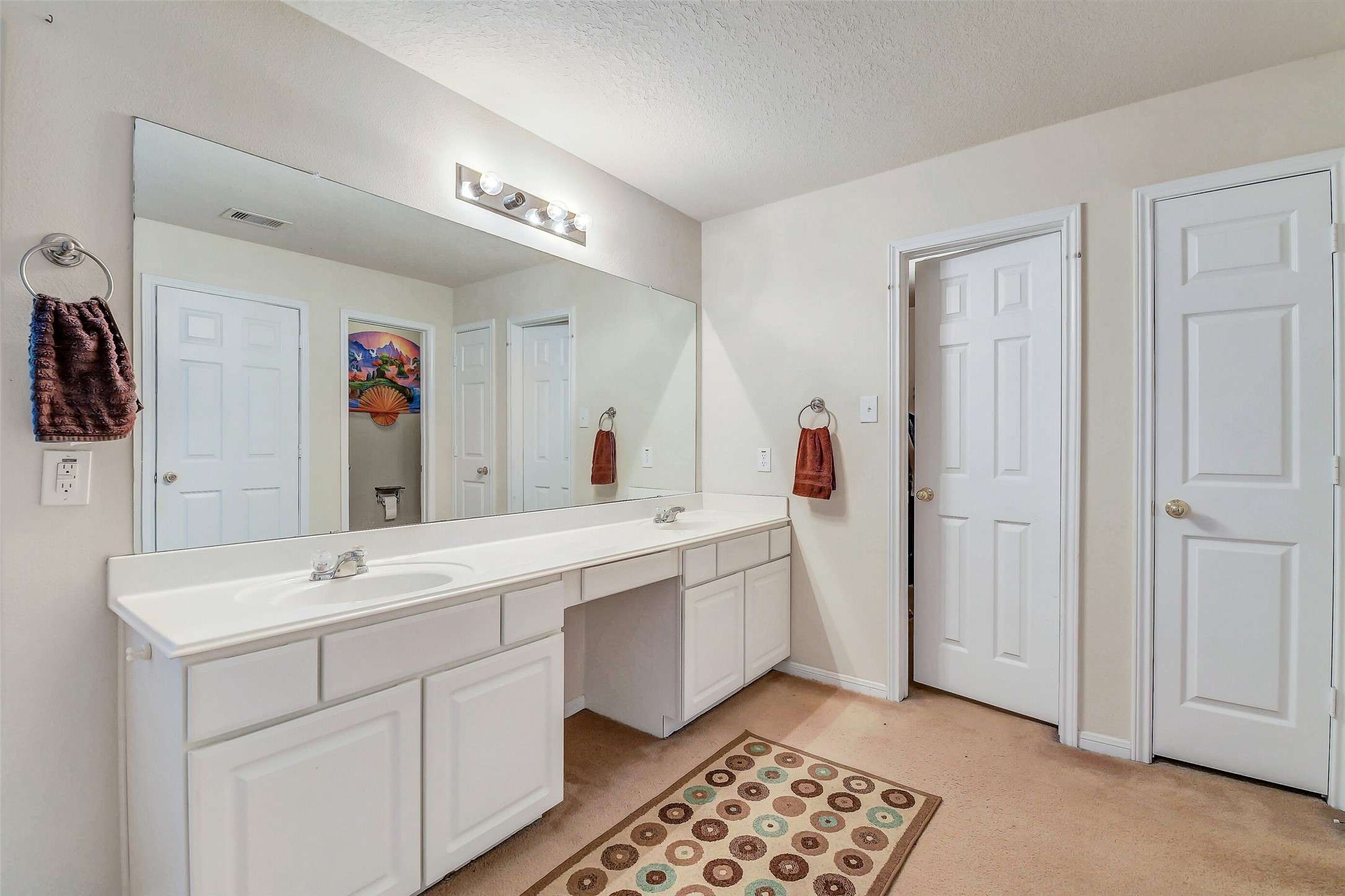 3407 Apple Dale Drive Houston, TX 77084 - Photo 21 of 37 a spacious bathroom with a double vanity sink a mirror and a shower