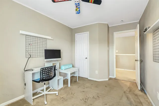 a view of work space with wooden floor and furniture