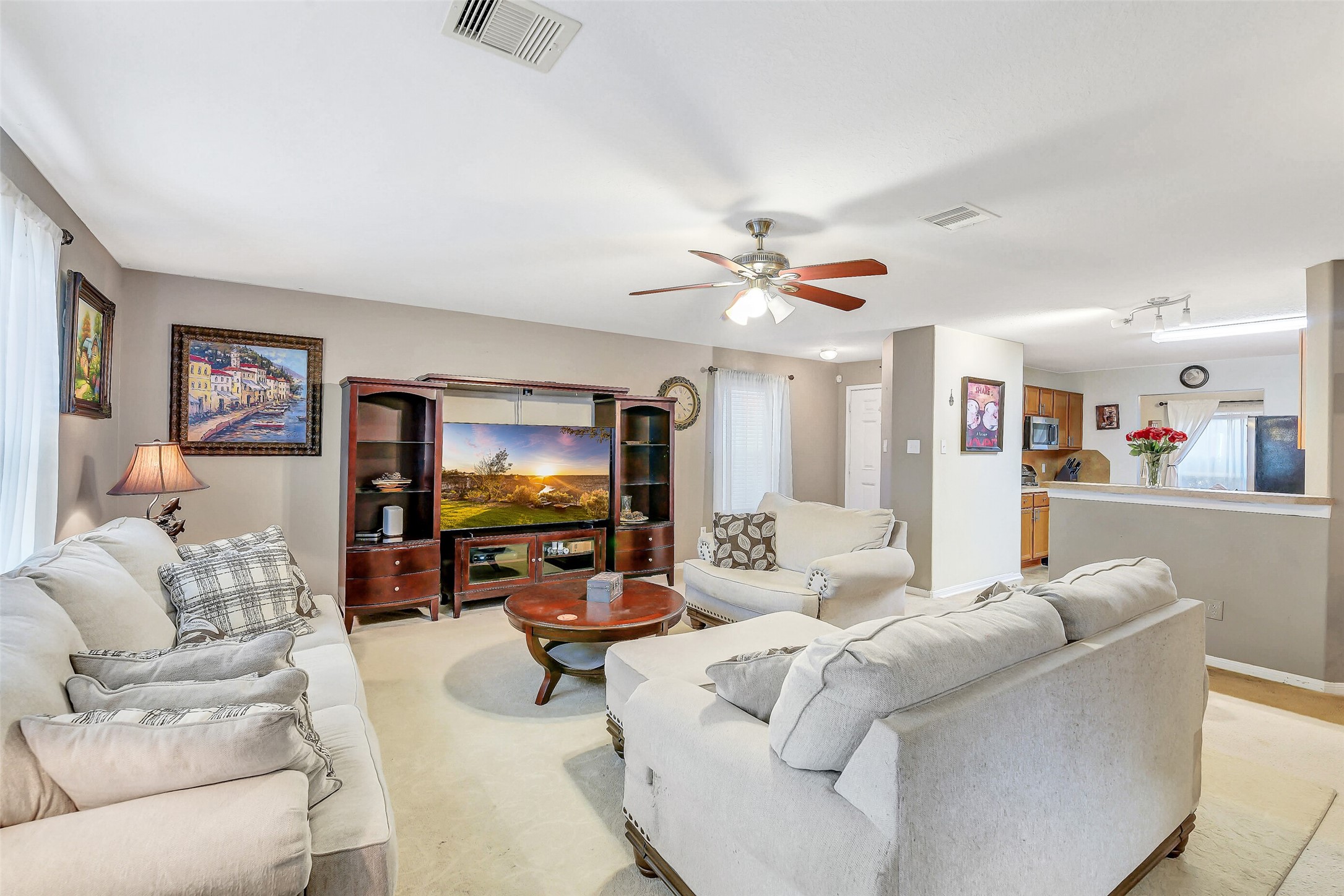 3407 Apple Dale Drive Houston, TX 77084 - Photo 4 of 37 a living room with furniture and a flat screen tv