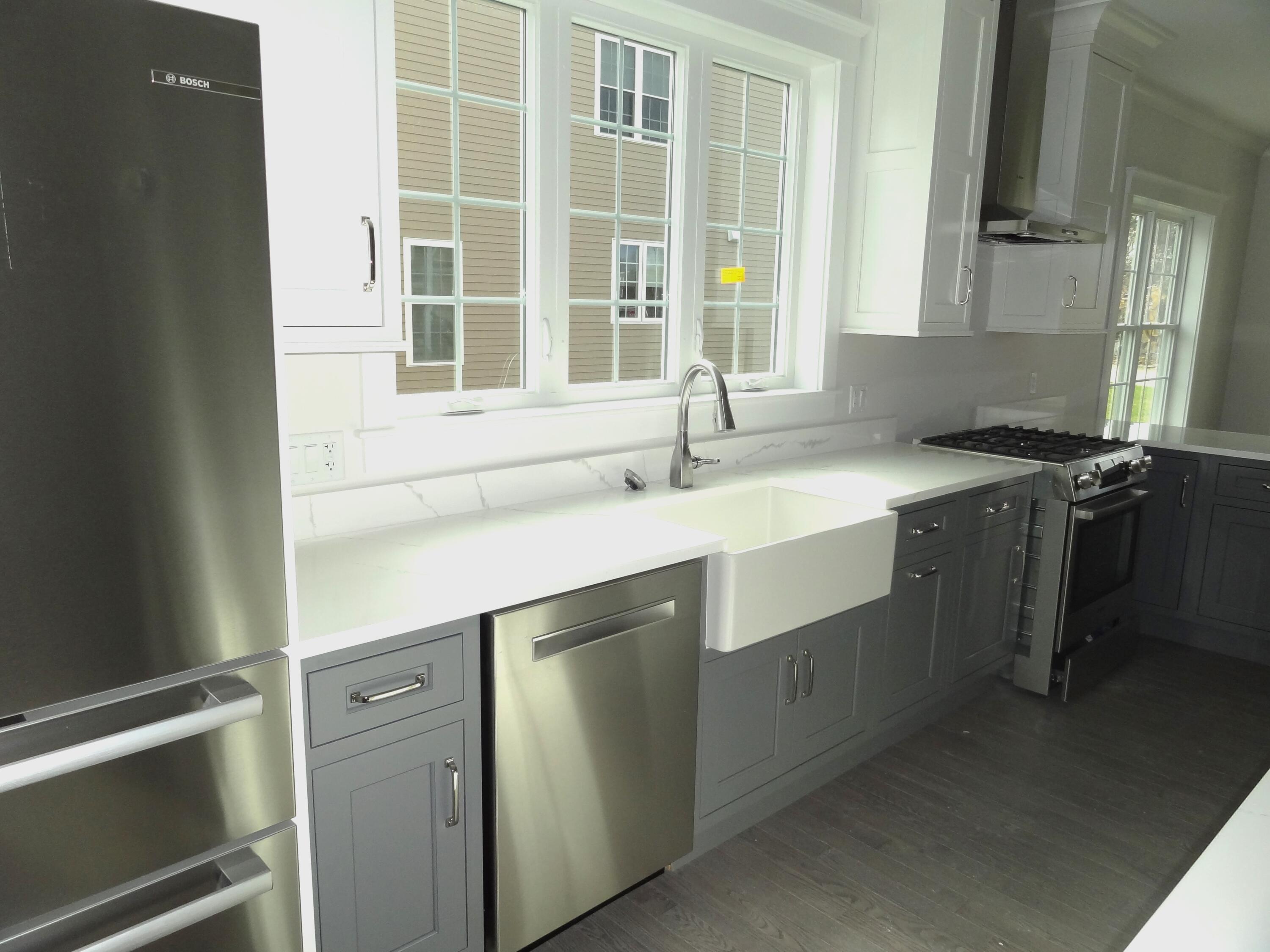 9 Cpe Clb Road East Falmouth, MA 02536 - Photo 11 of 58 a sink with granite countertop a sink and a window