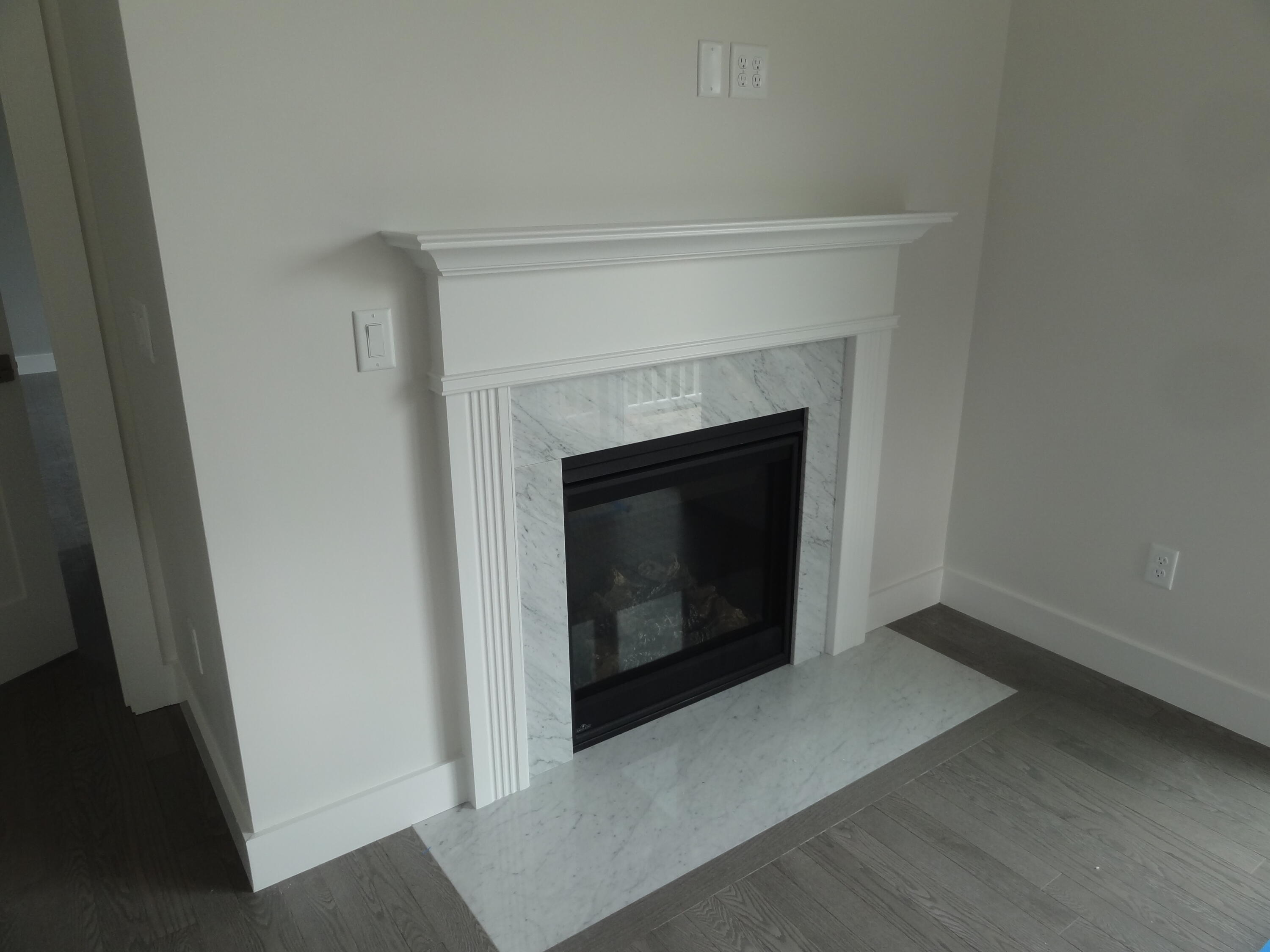 9 Cpe Clb Road East Falmouth, MA 02536 - Photo 13 of 58 a living room with a fireplace