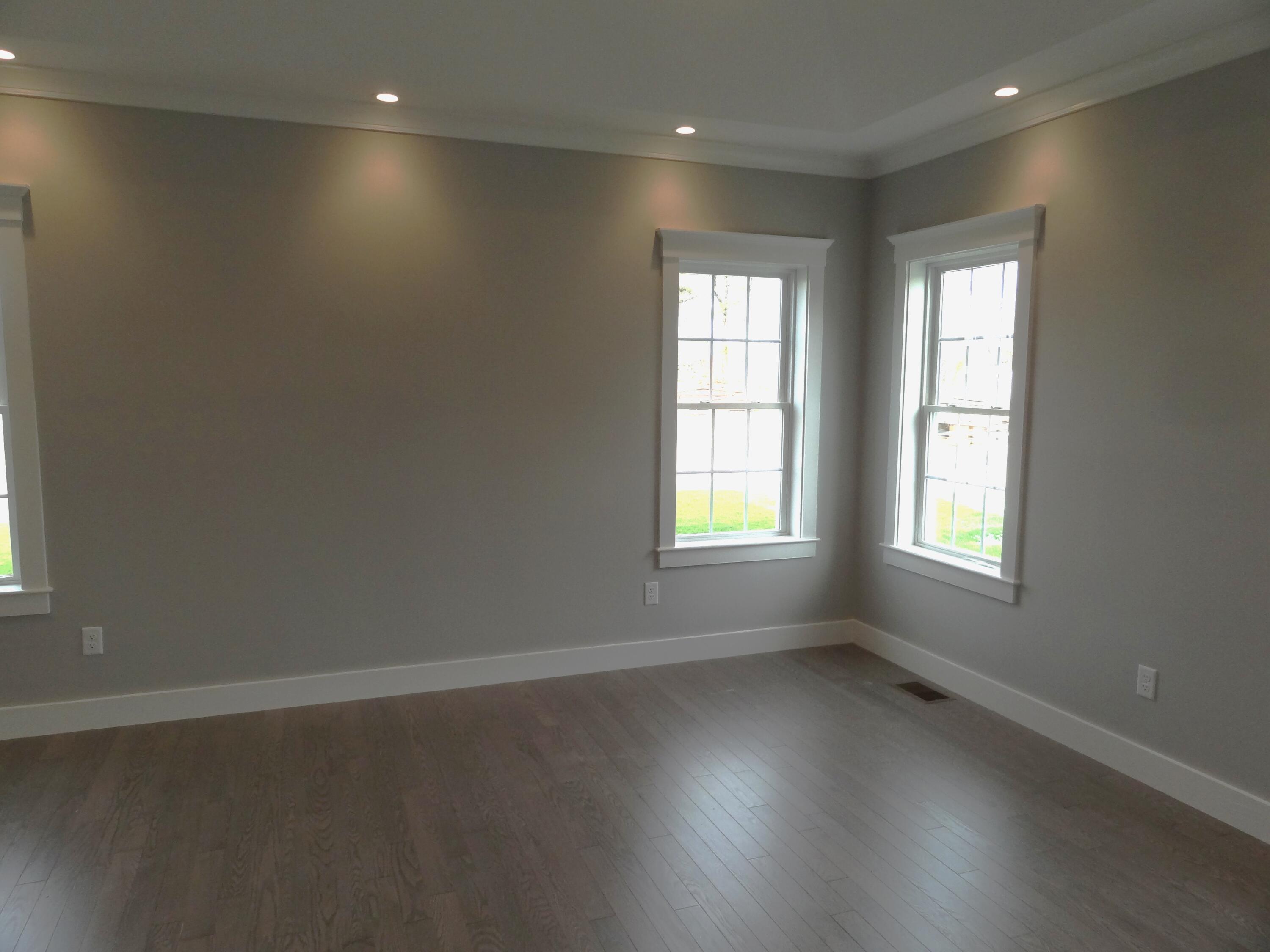 9 Cpe Clb Road East Falmouth, MA 02536 - Photo 14 of 58 an empty room with wooden floor and windows