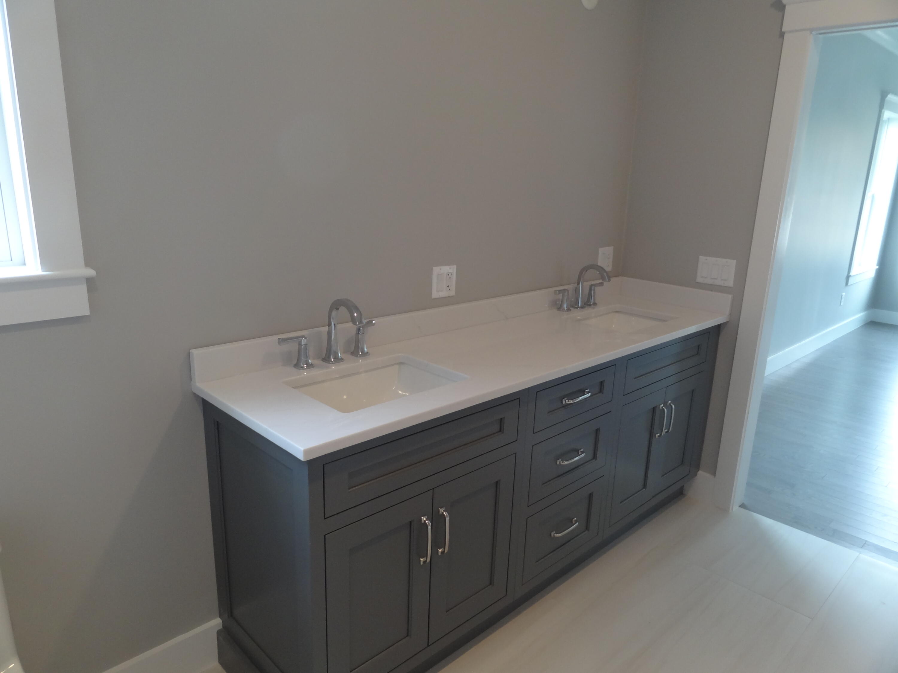 9 Cpe Clb Road East Falmouth, MA 02536 - Photo 17 of 58 a bathroom with a sink and a mirror