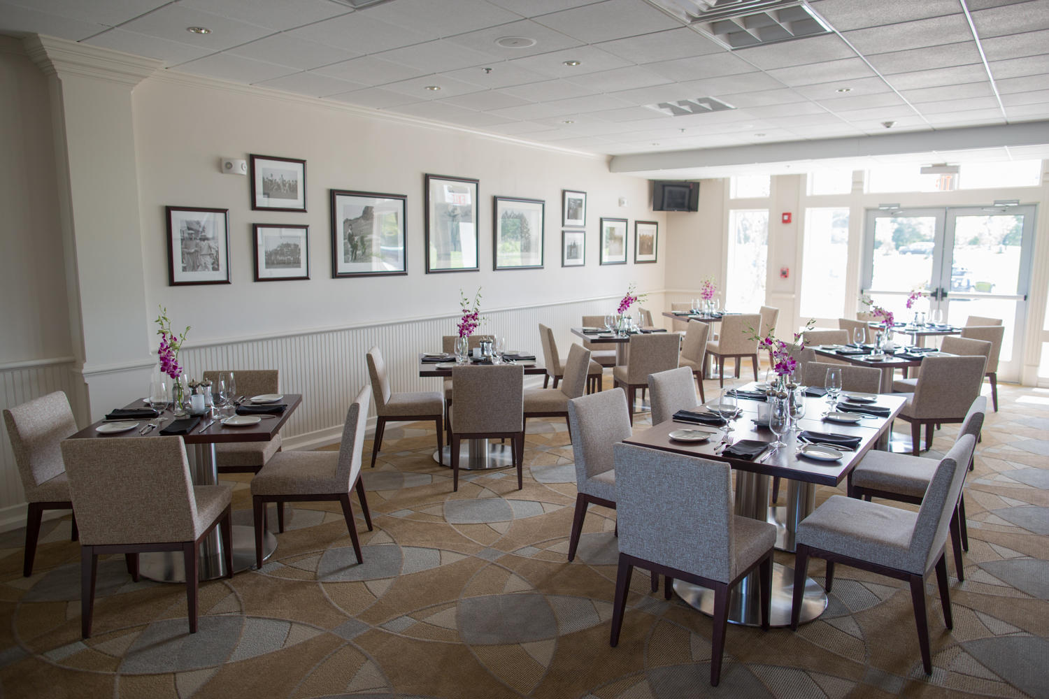 9 Cpe Clb Road East Falmouth, MA 02536 - Photo 29 of 58 a dining room with furniture a large window and a rug