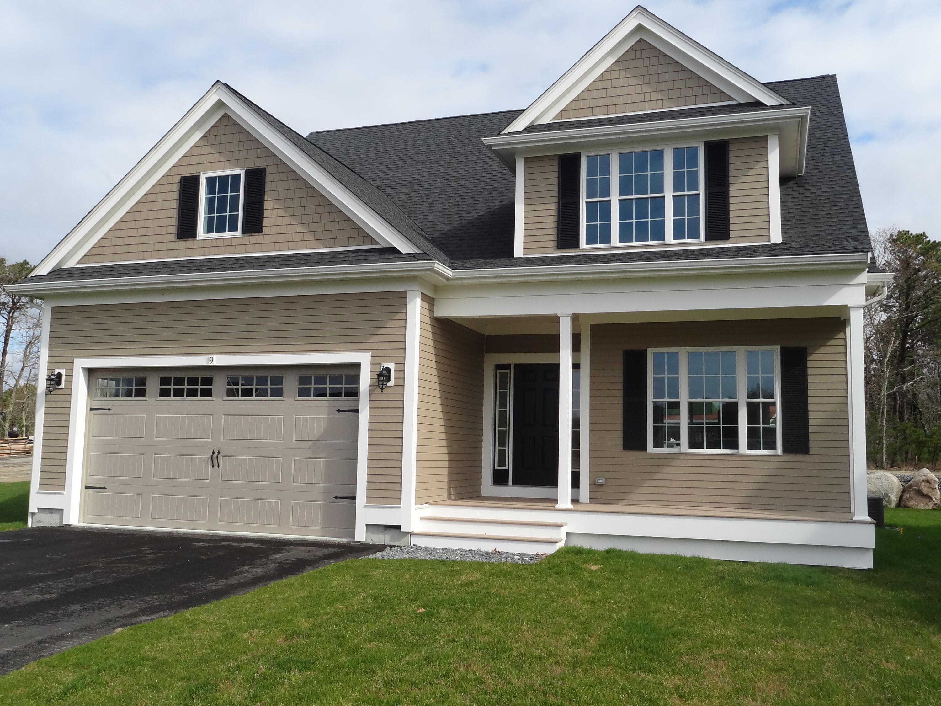 9 Cpe Clb Road East Falmouth, MA 02536 - Photo 3 of 58 front view of a house with a yard