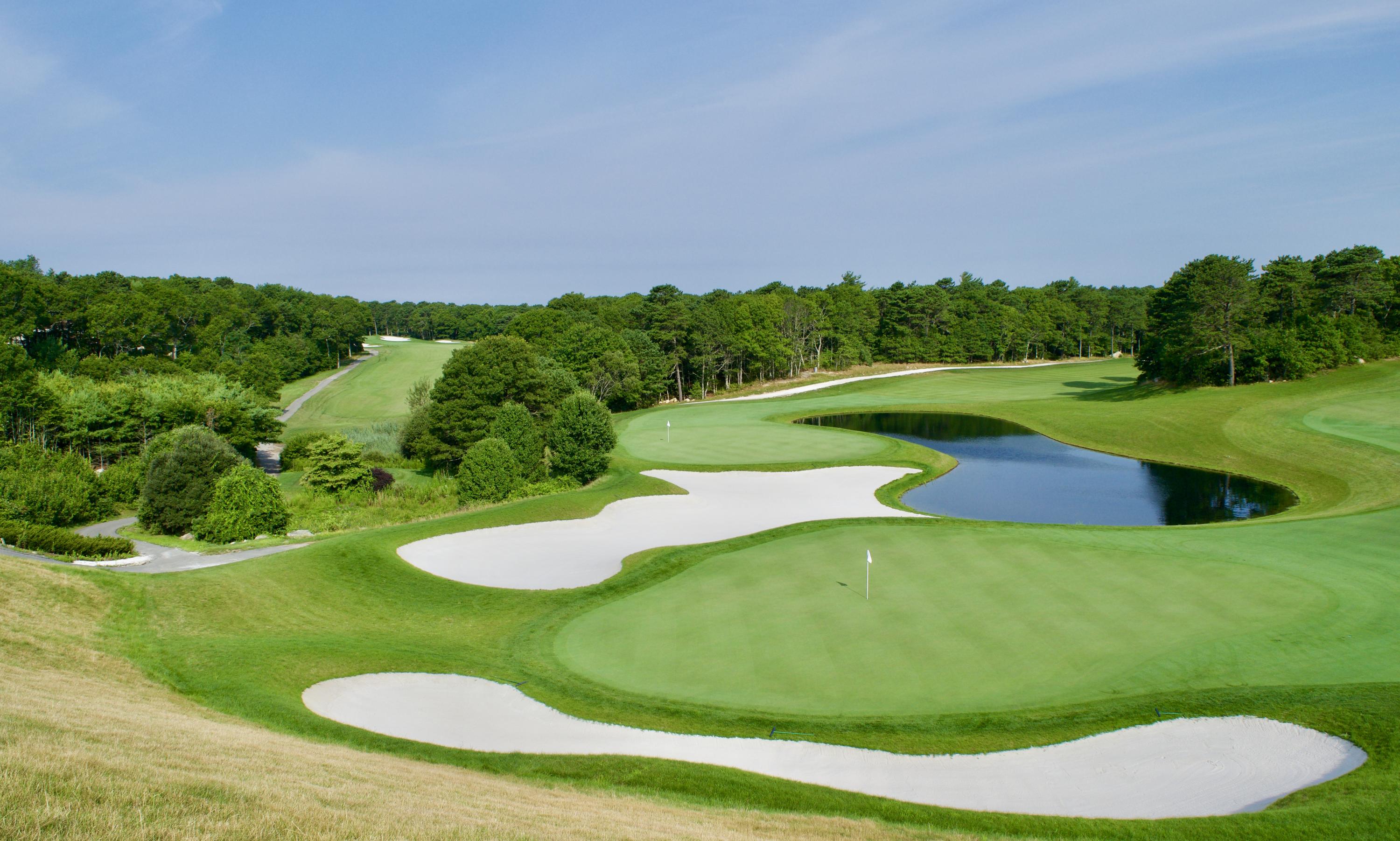 9 Cpe Clb Road East Falmouth, MA 02536 - Photo 35 of 58 a view of a golf course with a garden