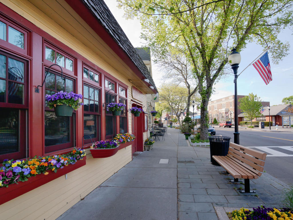 9 Cpe Clb Road East Falmouth, MA 02536 - Photo 49 of 58 a group of people sitting in front of a building