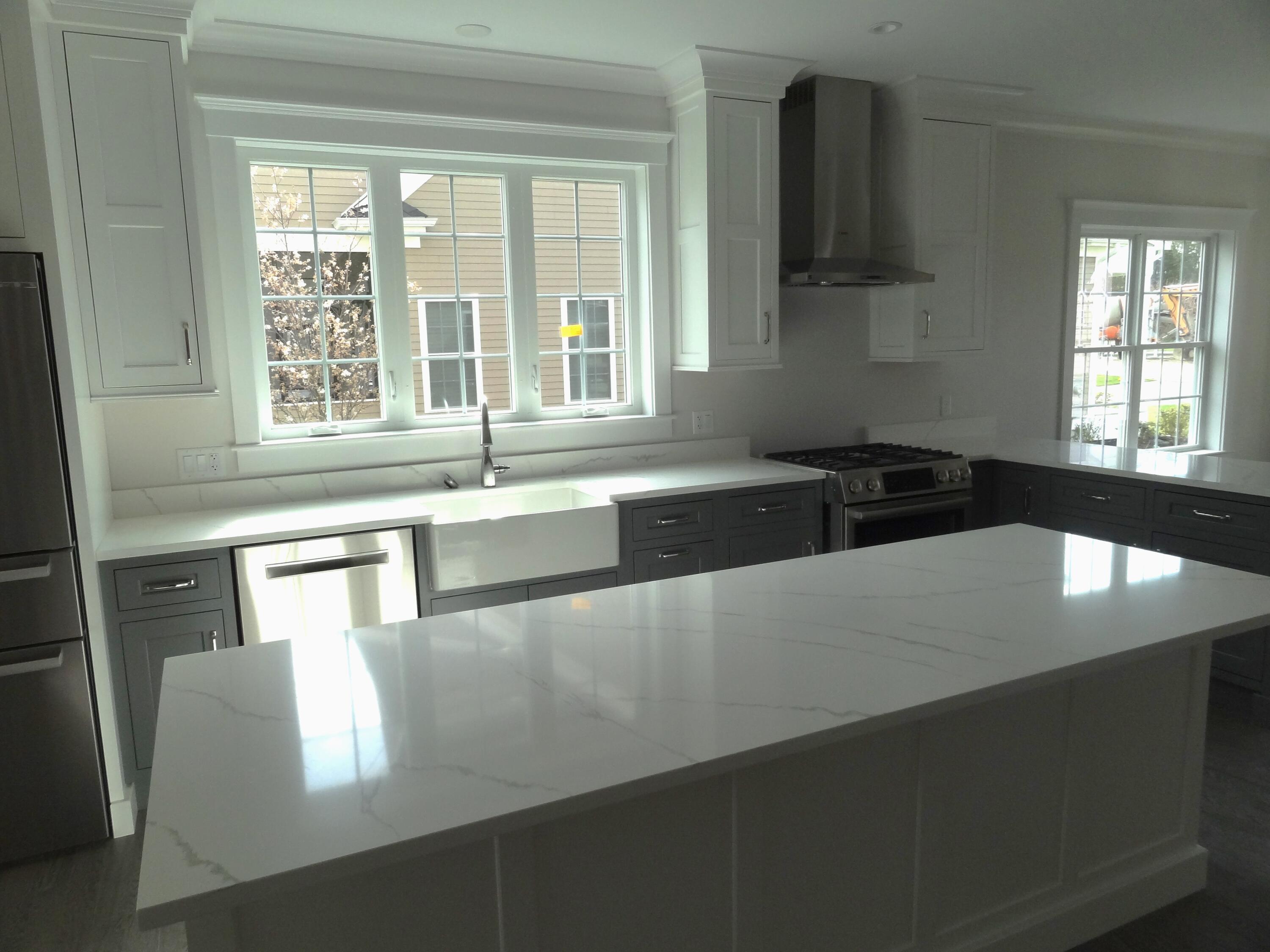 9 Cpe Clb Road East Falmouth, MA 02536 - Photo 9 of 58 a kitchen with granite countertop a sink a stove and a refrigerator