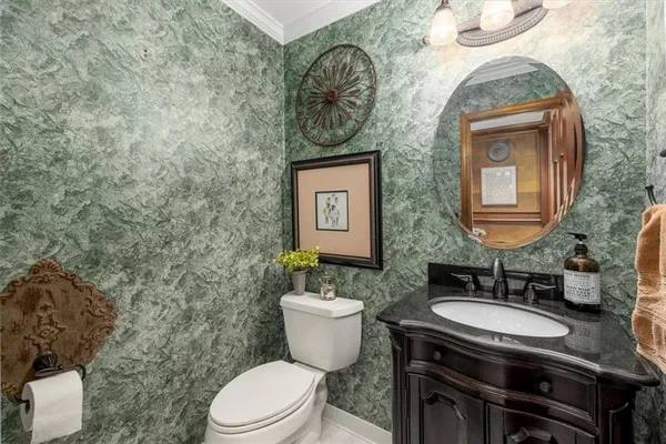 a living room with furniture window and a fireplace