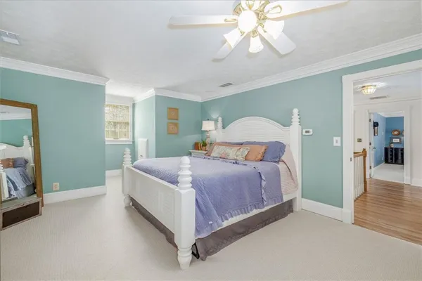 a view of a livingroom with furniture a table and chairs