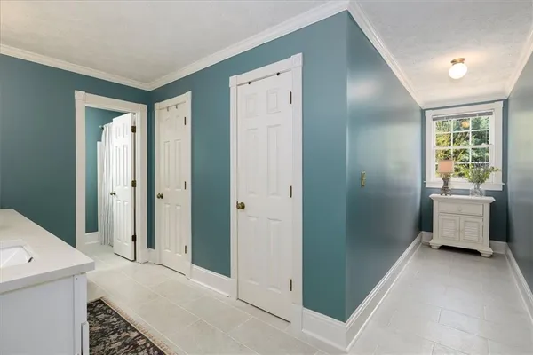 a spacious bedroom with a bed and a desk