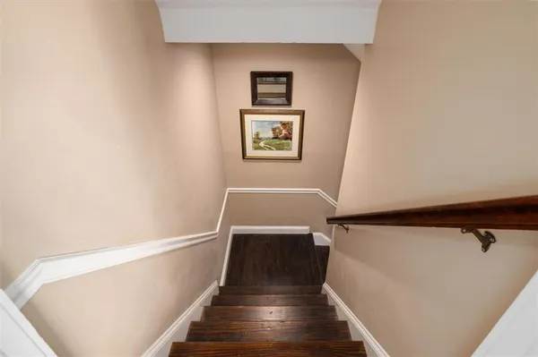 a spacious bedroom with a bed and a couch