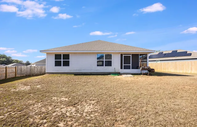 a house with yard in front of it