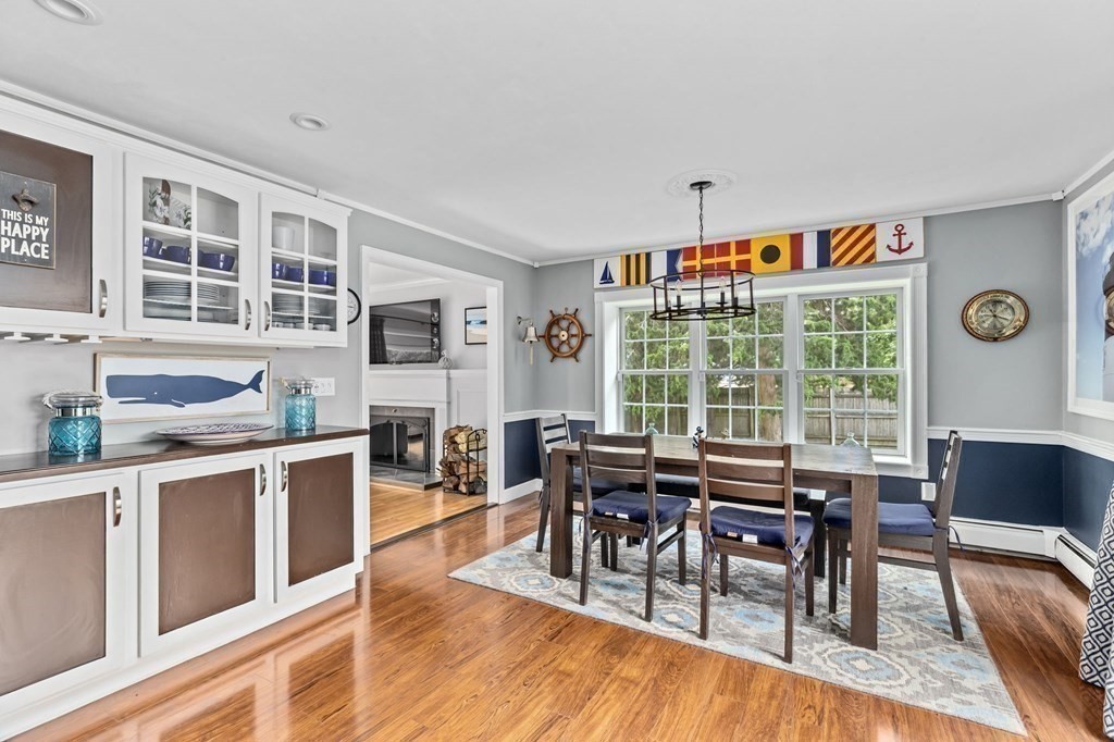 5 Atina Road Marshfield, MA 02050 - Photo 11 of 39 a view of a dining room with furniture window and wooden floor