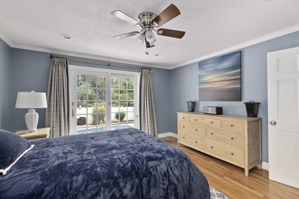 5 Atina Road Marshfield, MA 02050 - Photo 15 of 39 a bedroom with a bed and a dresser