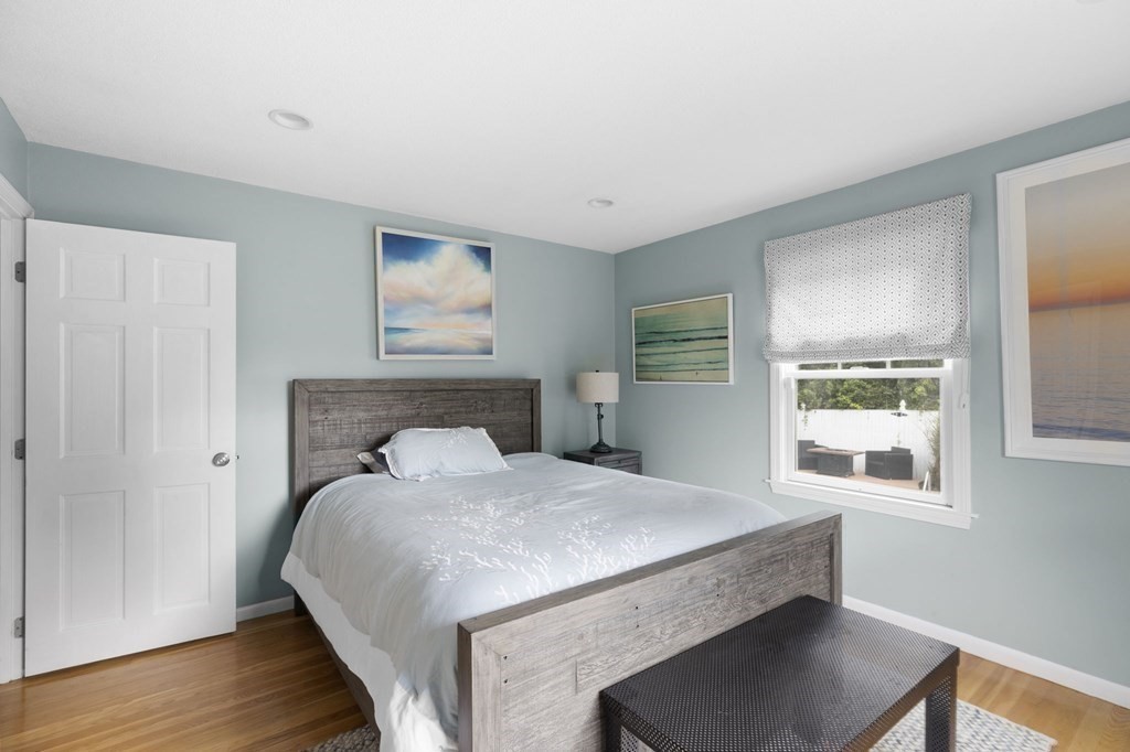 5 Atina Road Marshfield, MA 02050 - Photo 17 of 39 a bedroom with a bed and a window