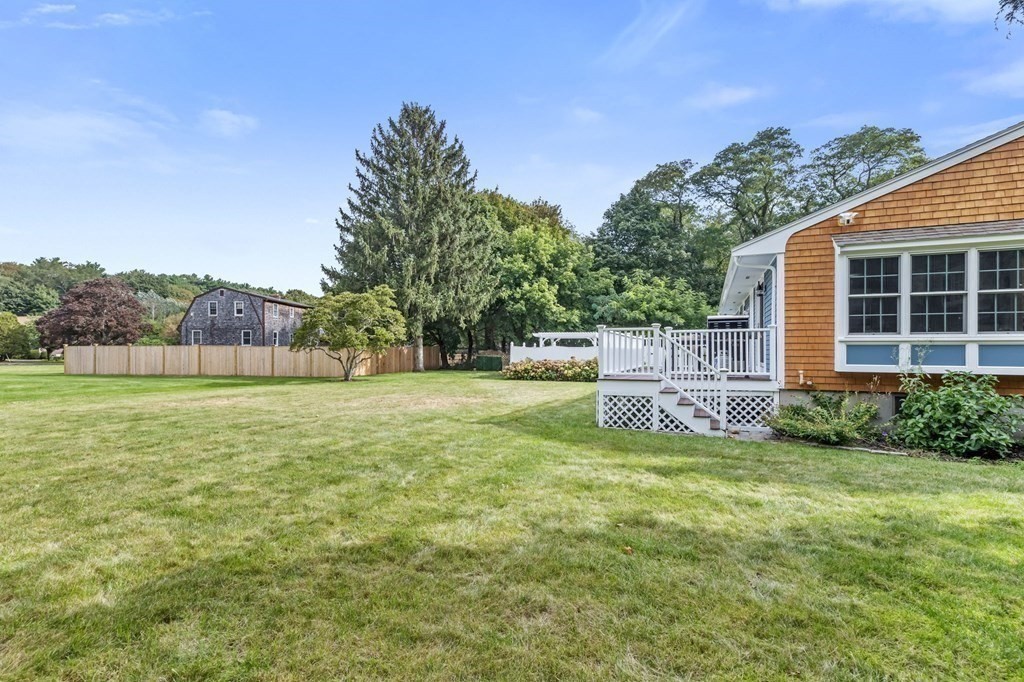 5 Atina Road Marshfield, MA 02050 - Photo 24 of 39 a view of a house with backyard and a garden