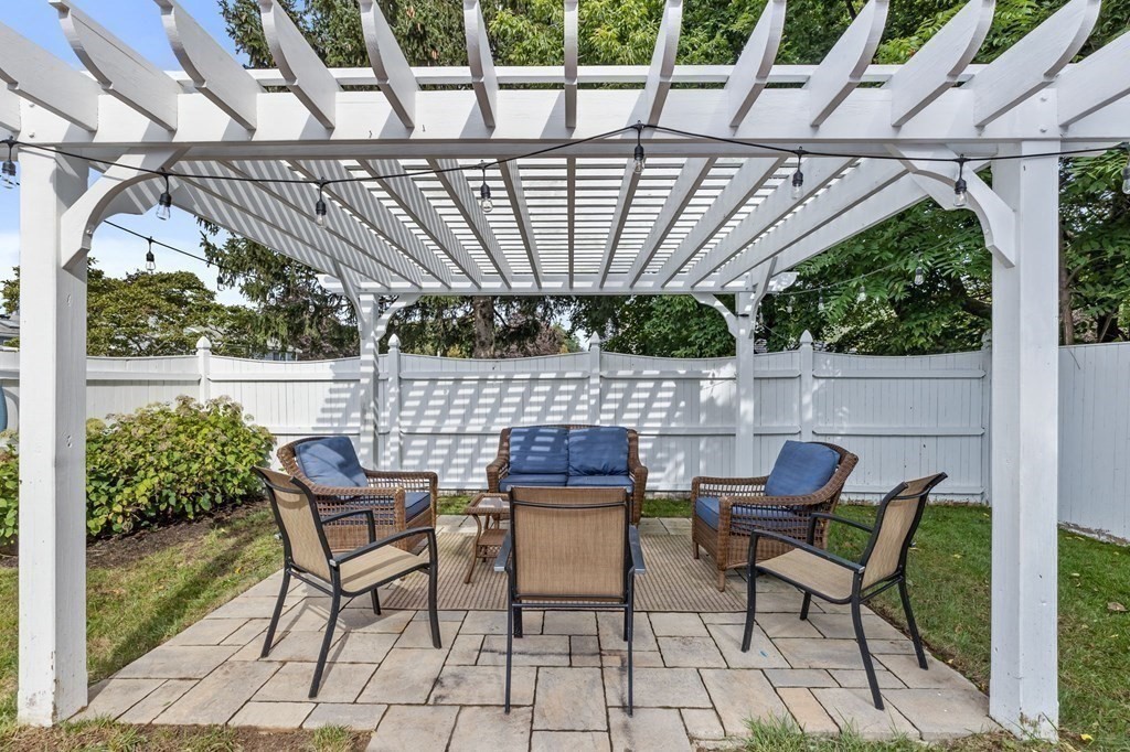 5 Atina Road Marshfield, MA 02050 - Photo 28 of 39 a patio with glass top table and chairs