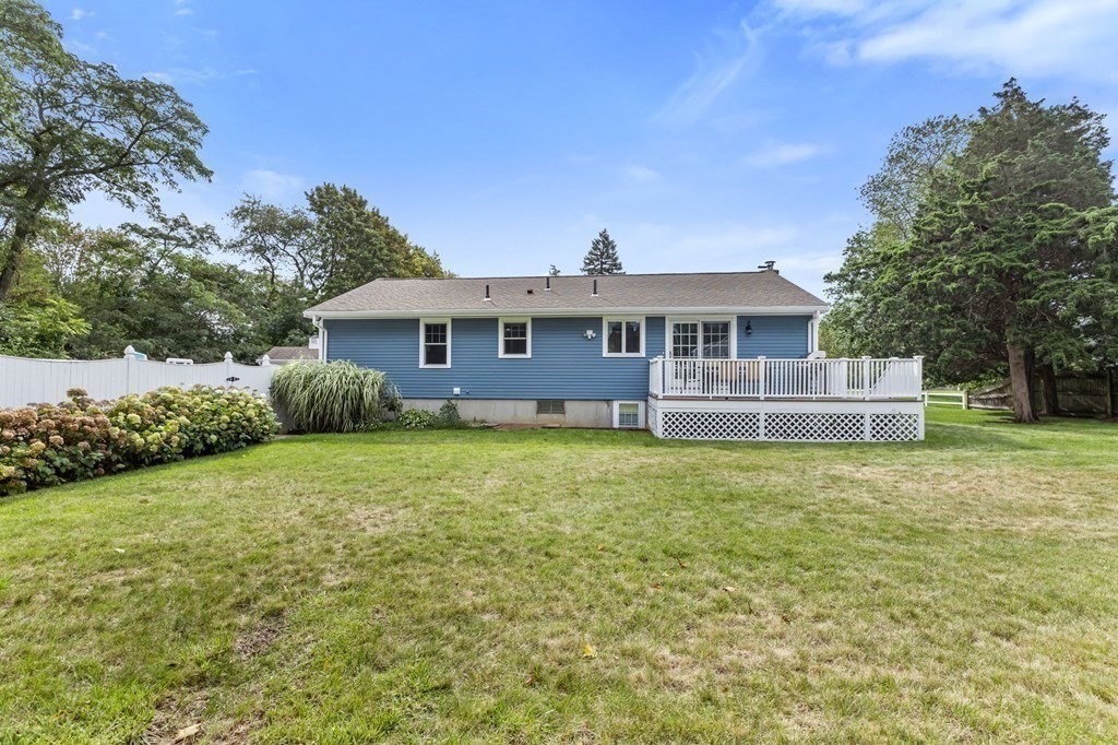 5 Atina Road Marshfield, MA 02050 - Photo 31 of 39 a front view of a house with a garden