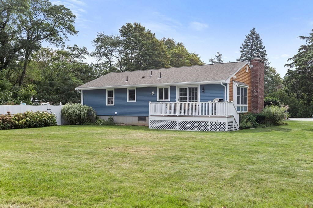 5 Atina Road Marshfield, MA 02050 - Photo 32 of 39 a front view of a house with a garden