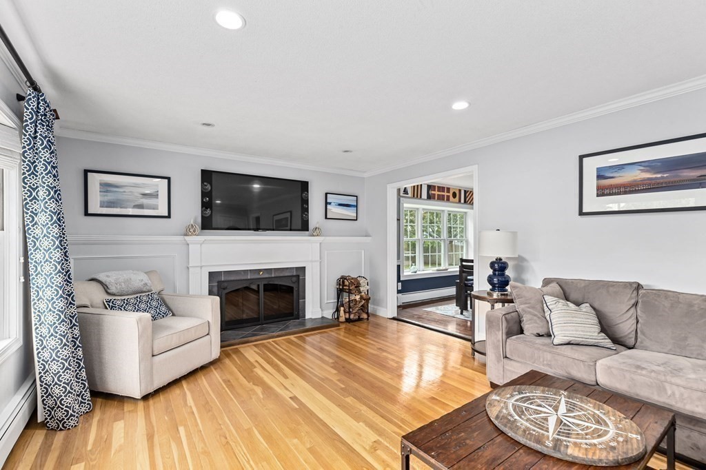 5 Atina Road Marshfield, MA 02050 - Photo 4 of 39 a living room with furniture and a fireplace
