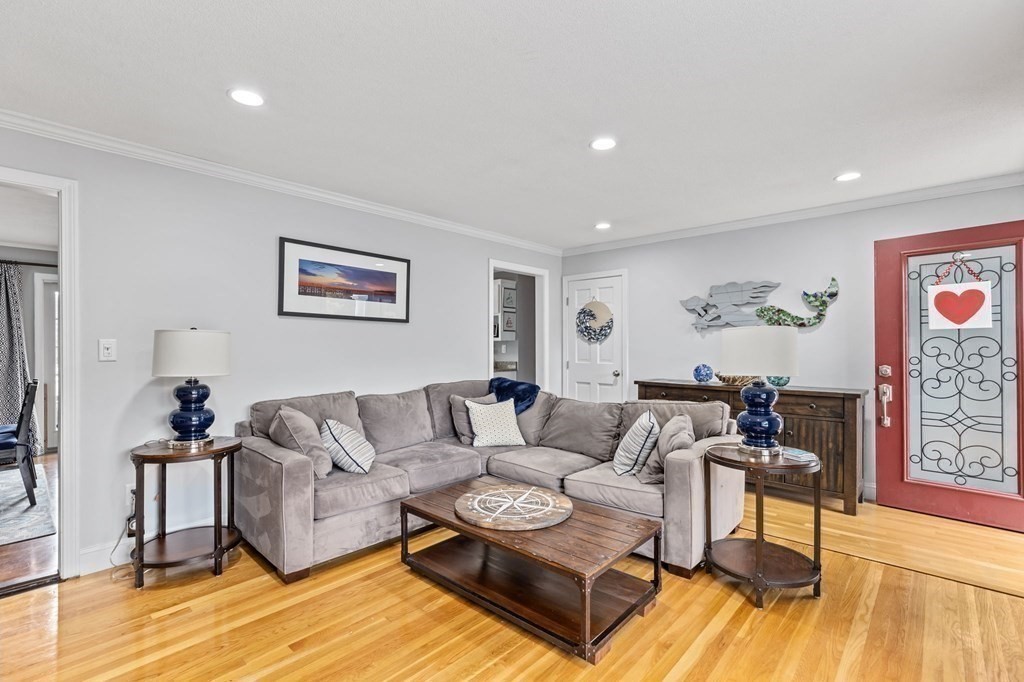 5 Atina Road Marshfield, MA 02050 - Photo 6 of 39 a living room with furniture and a wooden floor