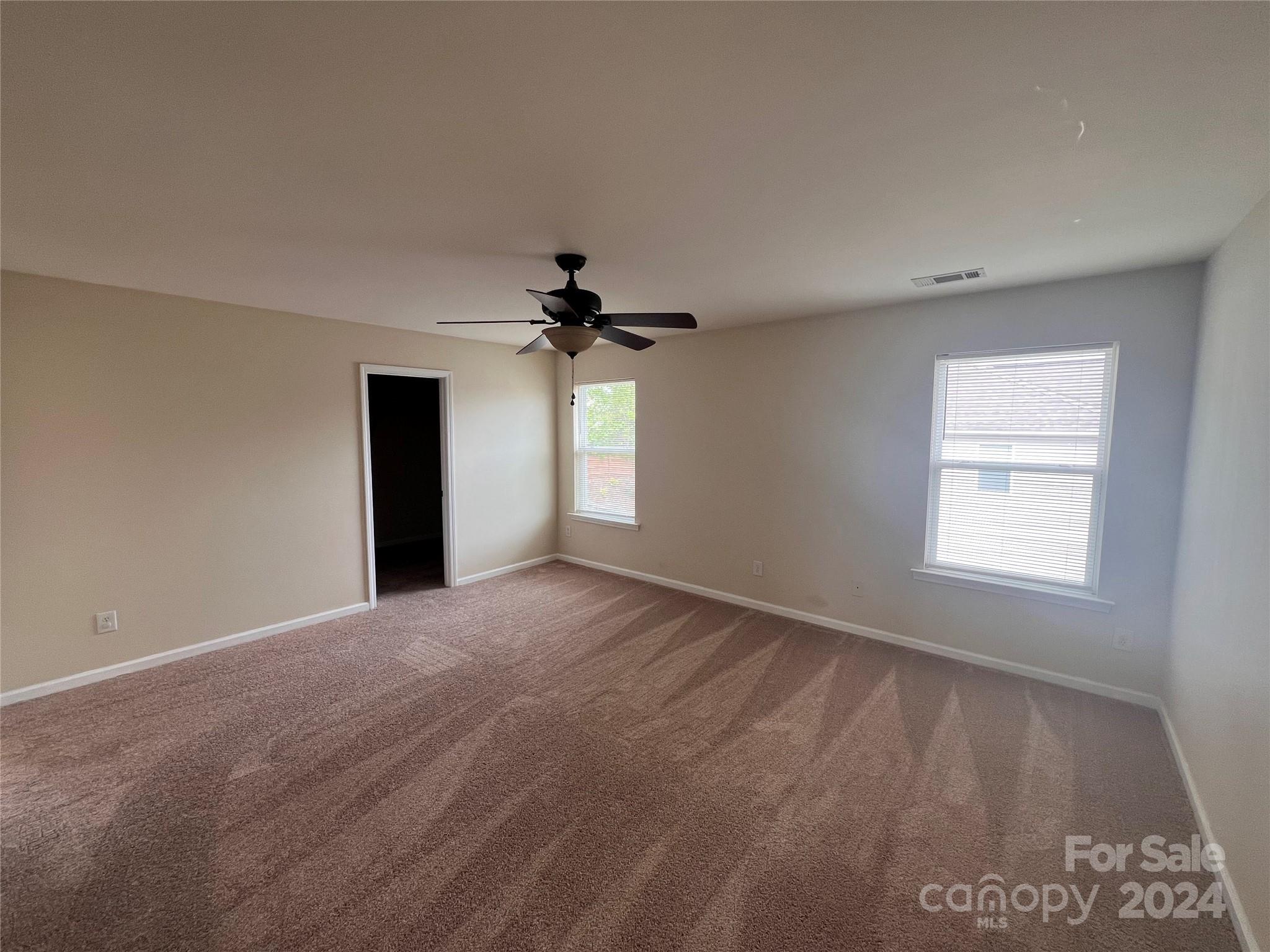 6702 Ferrell Commons Road Charlotte, NC 28269 - Photo 15 of 20 a view of an empty room with a window