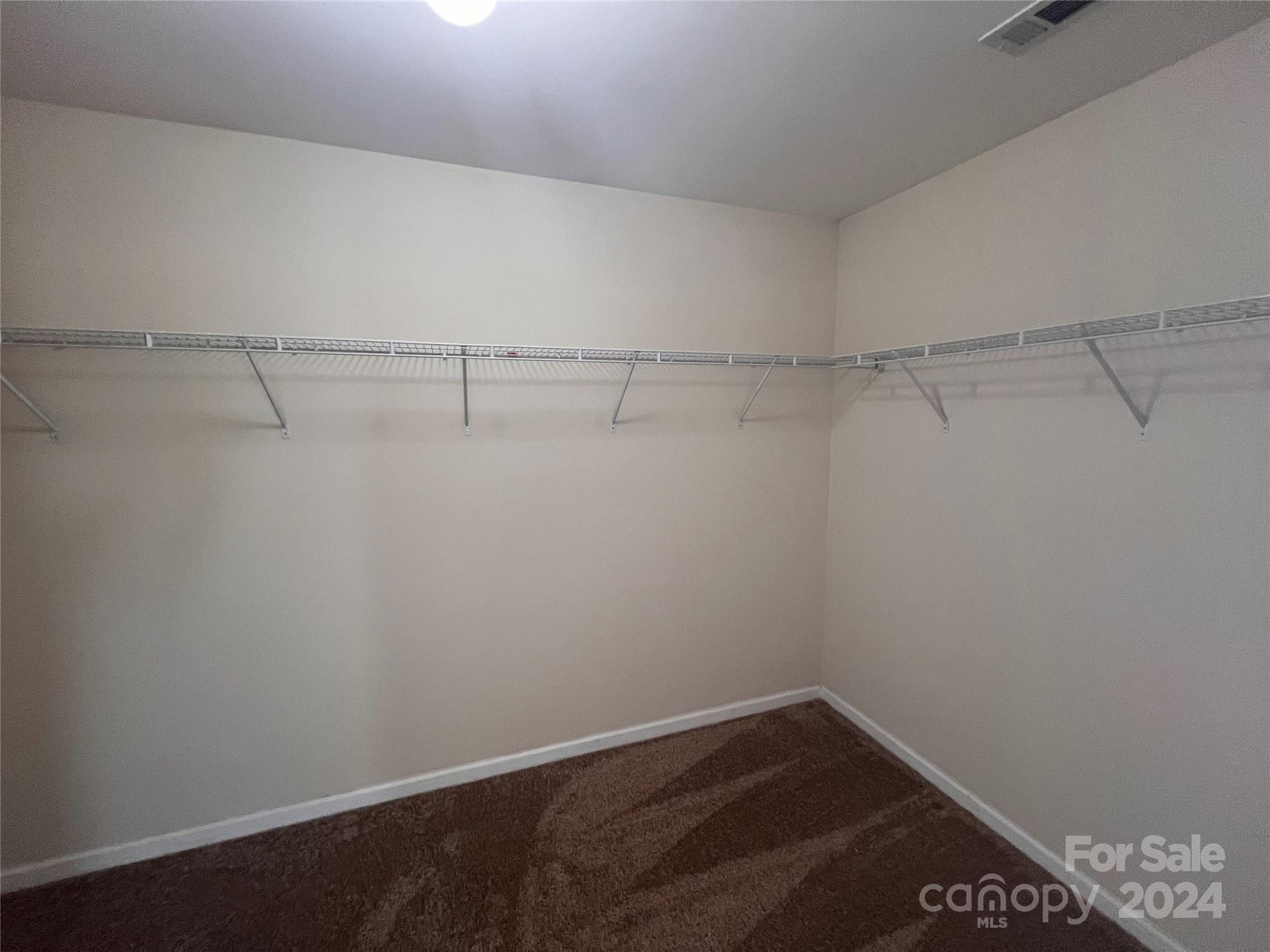 6702 Ferrell Commons Road Charlotte, NC 28269 - Photo 16 of 20 a view of a room with racks on the wall