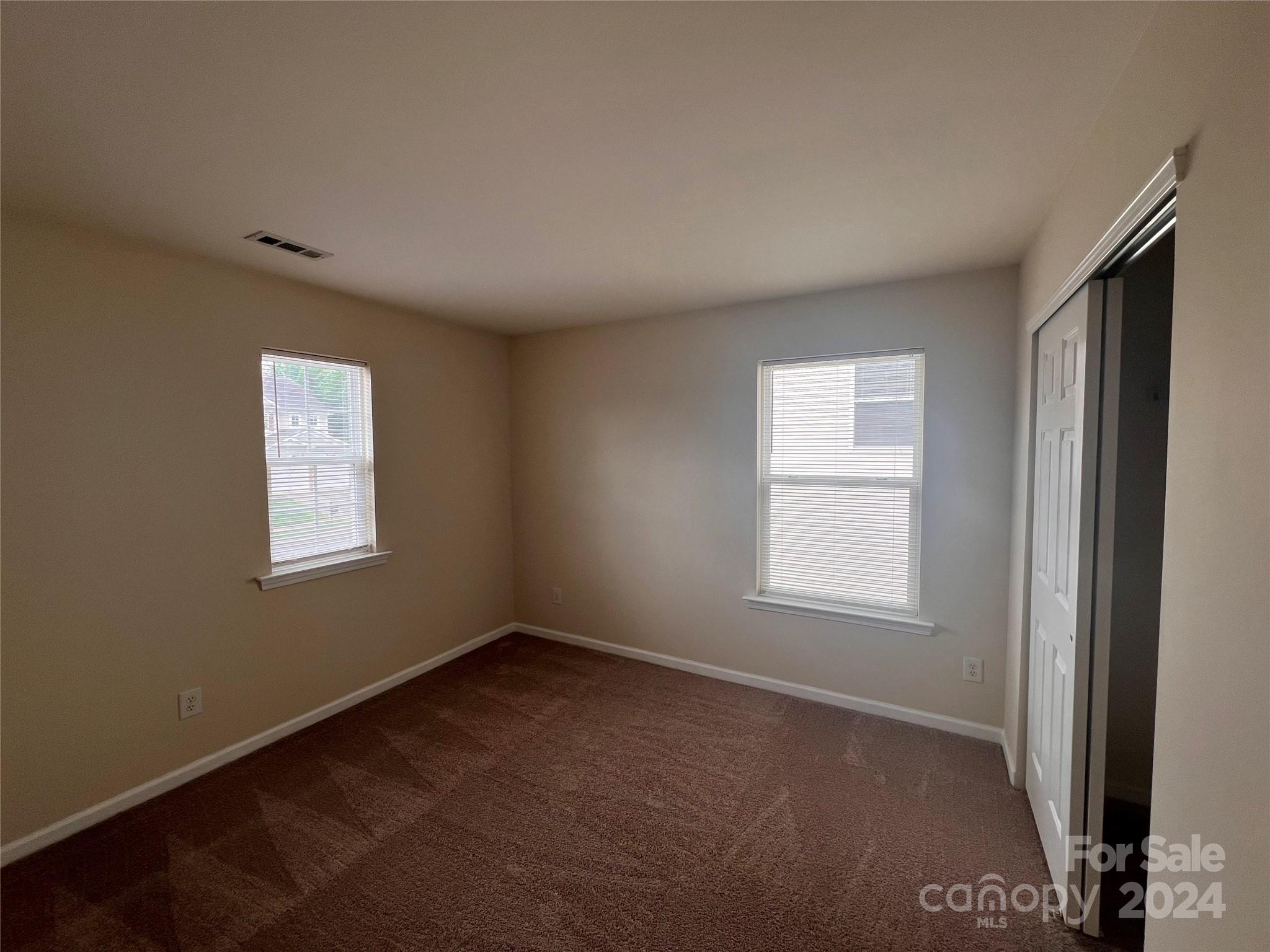 6702 Ferrell Commons Road Charlotte, NC 28269 - Photo 20 of 20 an empty room with a window
