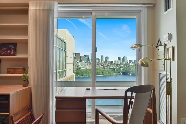 a view of a balcony door and furniture