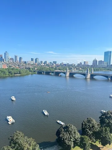 a view of a lake with a city