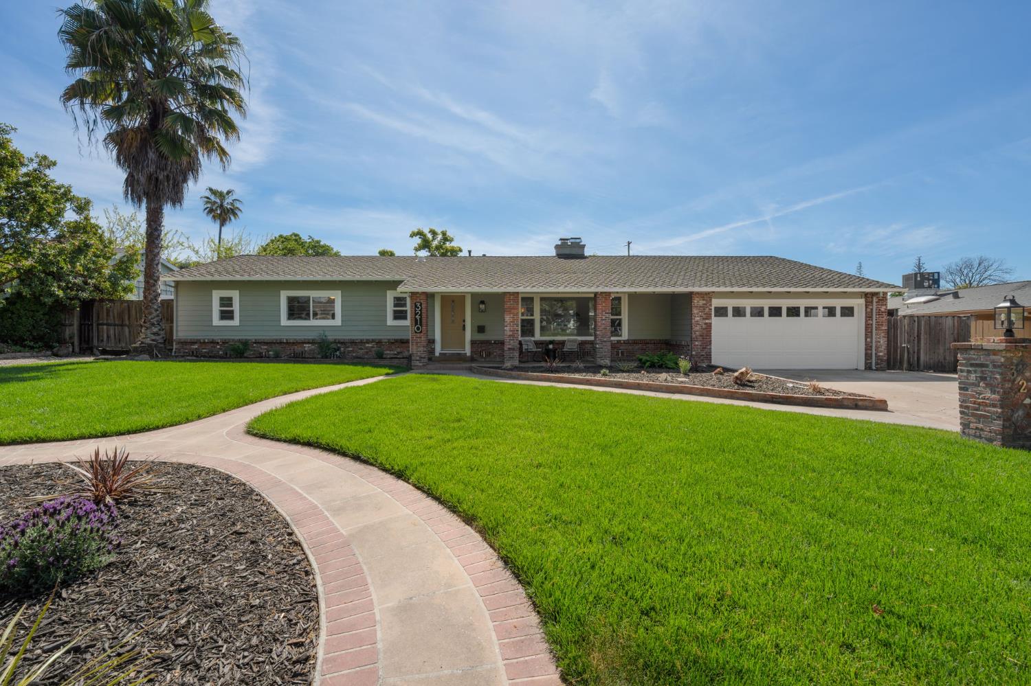 3210 Fieldcrest Drive Sacramento, CA 95821 - Photo 1 of 1 a front view of a house with garden
