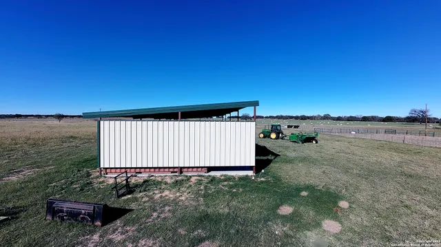 a view of a backyard with water view