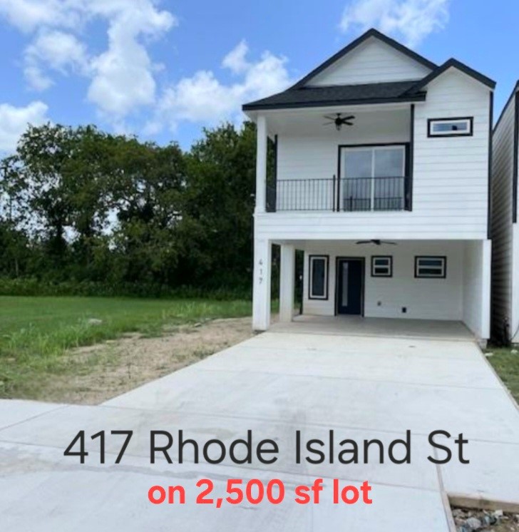 9720 Bucroft Street Houston, TX 77029 - Photo 11 of 12 a front view of a house with garden