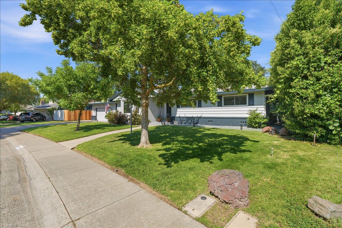 4849 Alexon Way Carmichael, CA 95608 - Photo 3 of 50 a front view of a house with garden