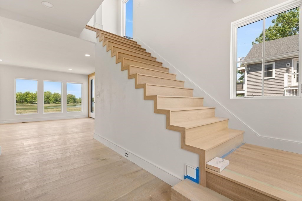 10 Chestnut Place Hingham, MA 02043 - Photo 12 of 41 a view of entryway and hall with wooden floor