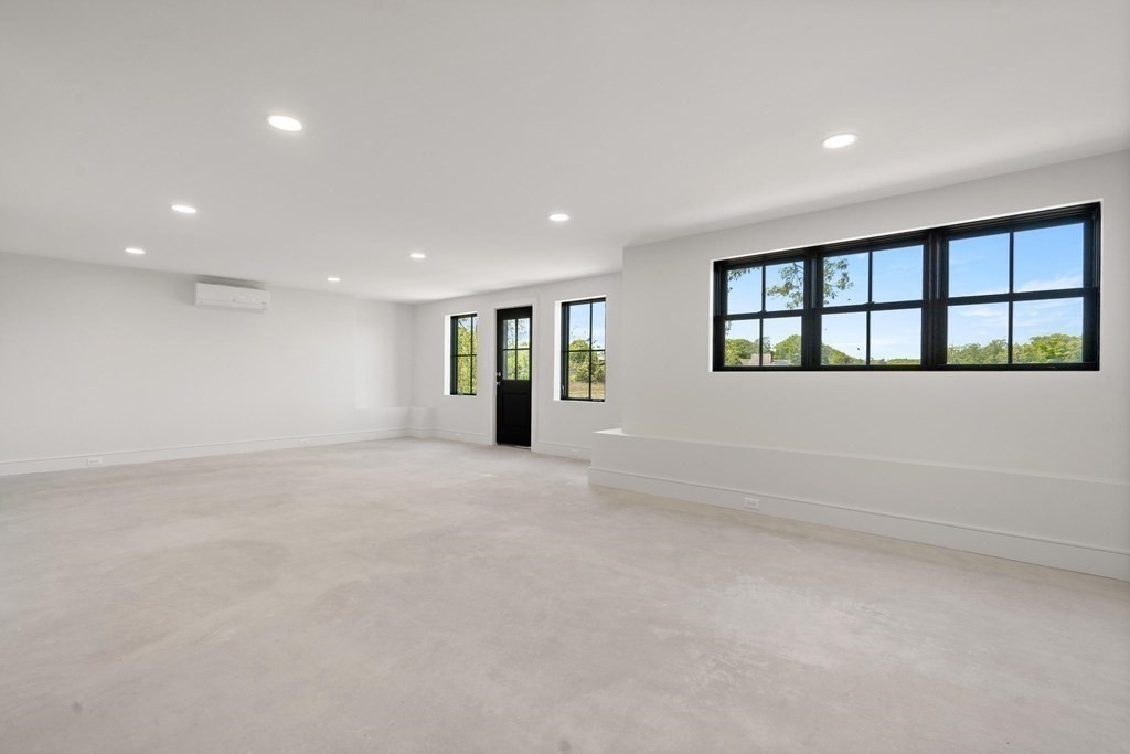 10 Chestnut Place Hingham, MA 02043 - Photo 21 of 41 a view of an empty room with a window