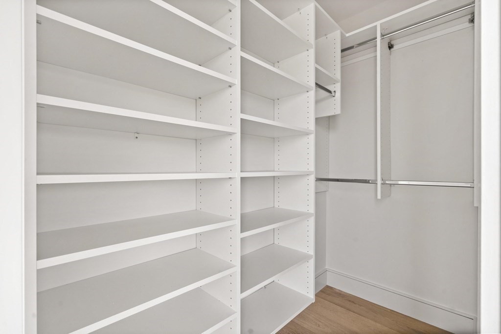 10 Chestnut Place Hingham, MA 02043 - Photo 25 of 41 a view of walk in closet with empty racks