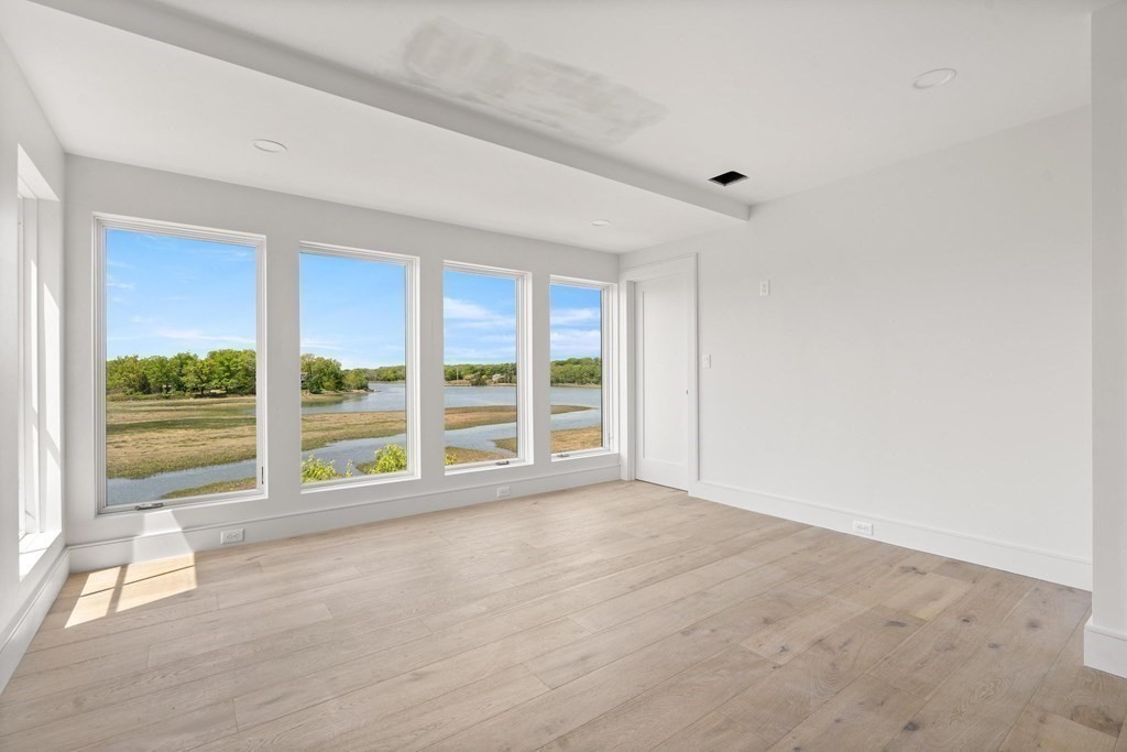 10 Chestnut Place Hingham, MA 02043 - Photo 26 of 41 a view of an empty room with a window