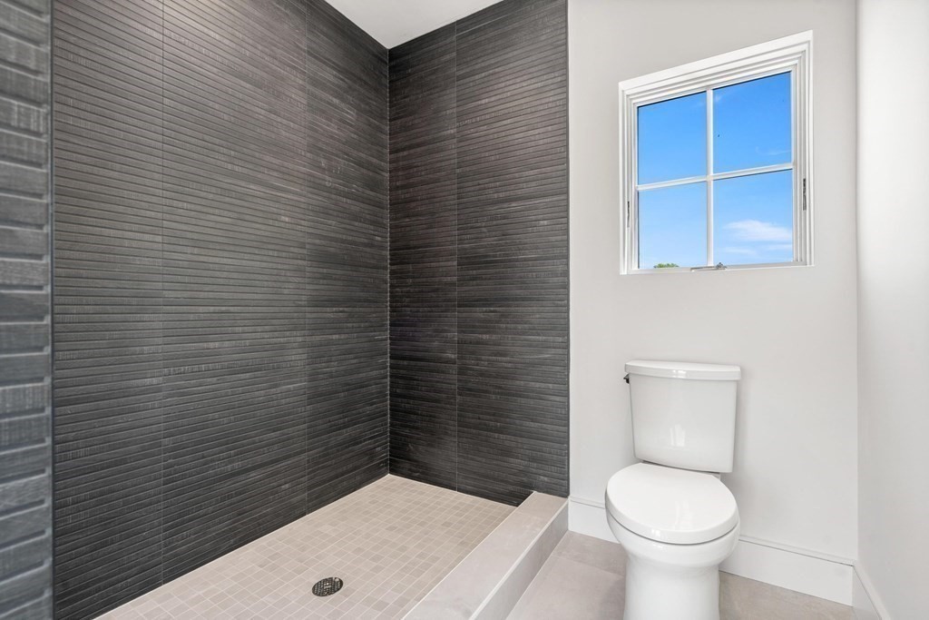 10 Chestnut Place Hingham, MA 02043 - Photo 34 of 41 a bathroom with a toilet and a sink