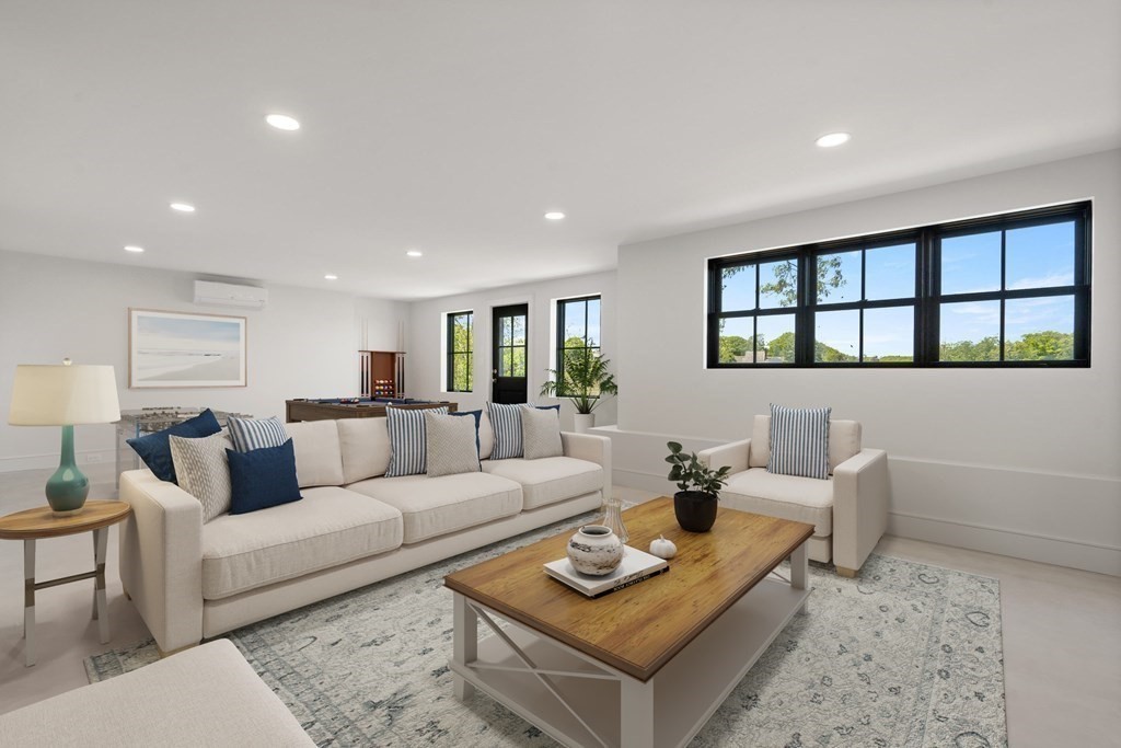 10 Chestnut Place Hingham, MA 02043 - Photo 6 of 41 a living room with furniture and a window with garden view