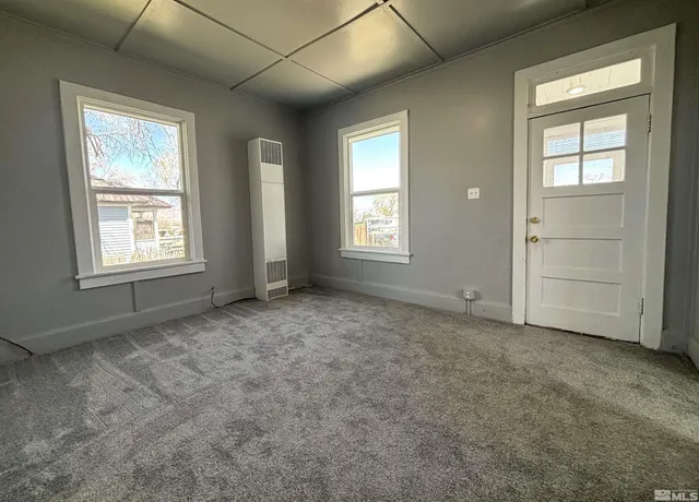 an empty room with windows