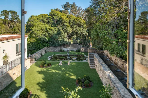 a view of a backyard with garden