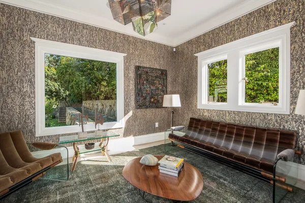 a living room with furniture and a window
