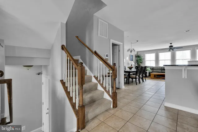a view of entryway and hall with dining room
