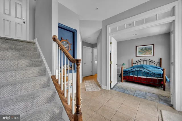 a view of a hallway with staircase
