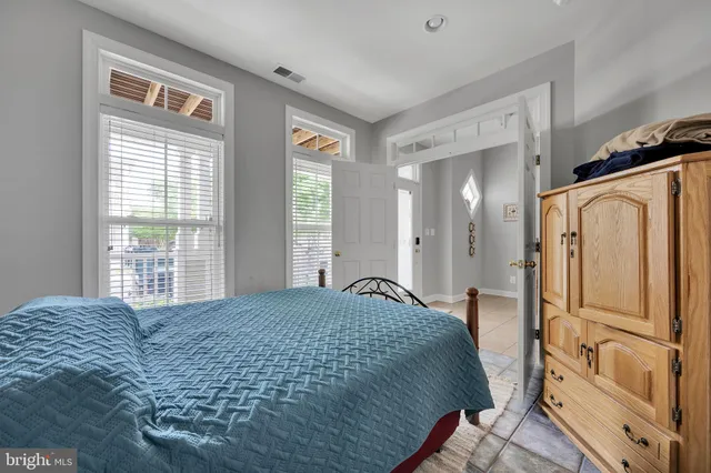 a bathroom with a sink toilet and a mirror