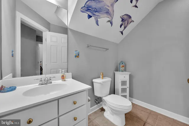 a view of a bathroom with a glass shower door
