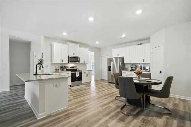 a view of kitchen with breakfast area